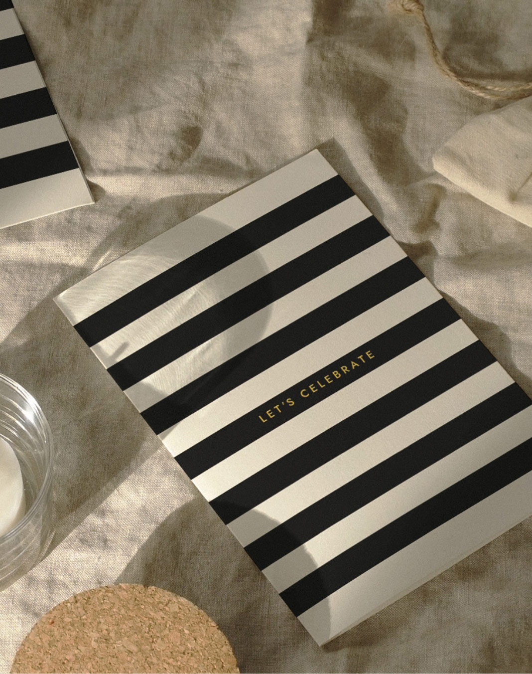 Send stylish wishes with the "Let's Celebrate" premium striped greeting card. Printed on luxurious FSC paper. Blank inside with a white envelope.
